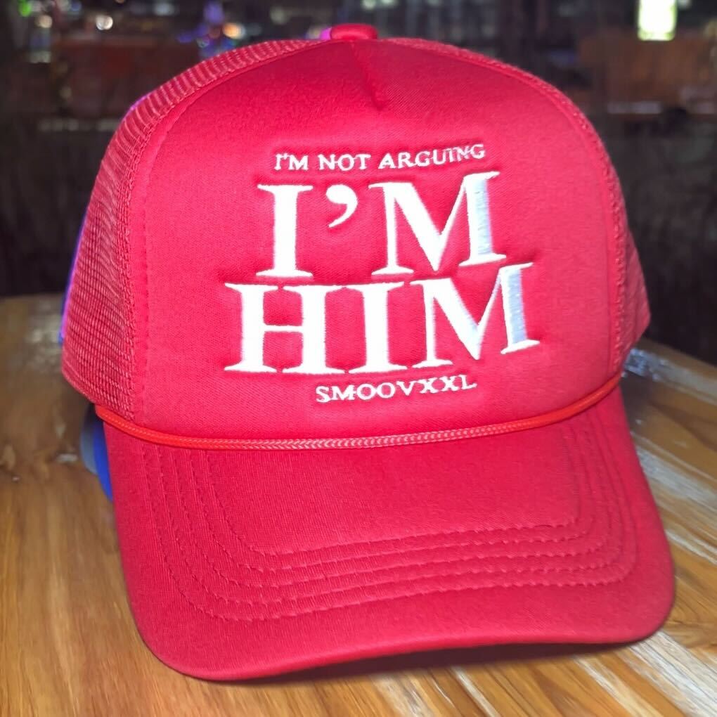 I’M NOT ARGUING- I’M HIM Trucker Hat (Red)